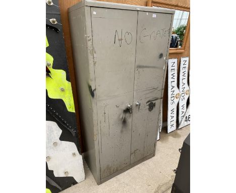 A VINTAGE METAL OFFICE STORAGE CABINET BEARING THE LABEL 'ART METAL LONDON' 