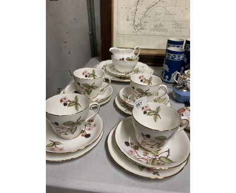 FOUR ADDERLEY CHINA TRIOS, A CAKE PLATE, CREAM JUG AND SUGAR BOWL ETC 