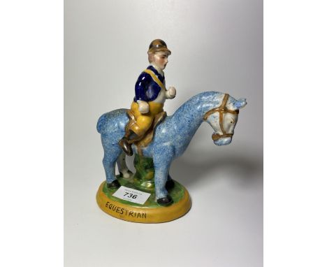 A STAFFORDSHIRE CERAMIC 'EQUESTRIAN' HORSE AND RIDER FIGURE 