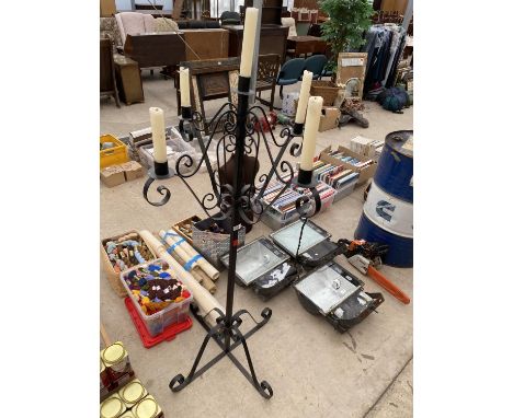 A VINTAGE STYLE WROUGHT IRON FOUR BRANCH CANDELABRA COMPLETE WITH CANDLES AND SNUFFER 
