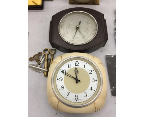 A VINTAGE SMITH'S KITCHEN CLOCK AND A BAKELITE BAROMETER 