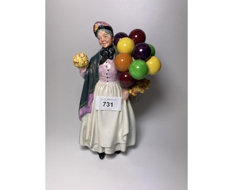 A ROYAL DOULTON 'BIDDY PENNYFARTHING' HN1843 CERAMIC FIGURE 