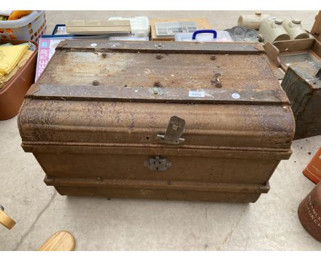 A VINTAGE METAL DOME TOPPED TRAVEL TRUNK 