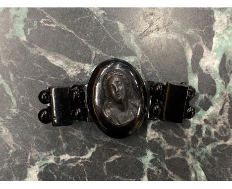 A VINTAGE WHITBY JET BRACELET 