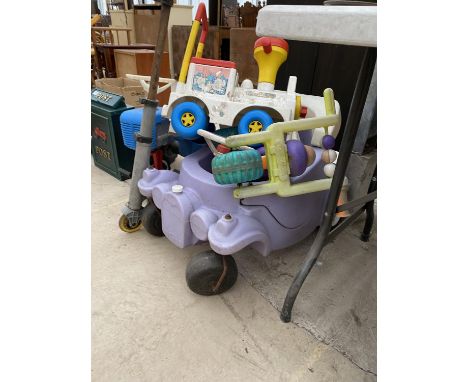 AN ASSORTMENT OF CHILDRENS TOYS TO INCLUDE A PEDAL TRACTOR AND A PUSH ALONG TRAIN ETC 