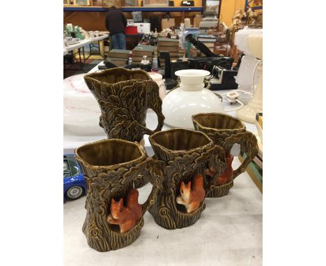 FOUR SYLVAC VINTAGE JUGS/VASES IN THE SHAPE OF TREE WITH A SQUIRREL DECORATION 