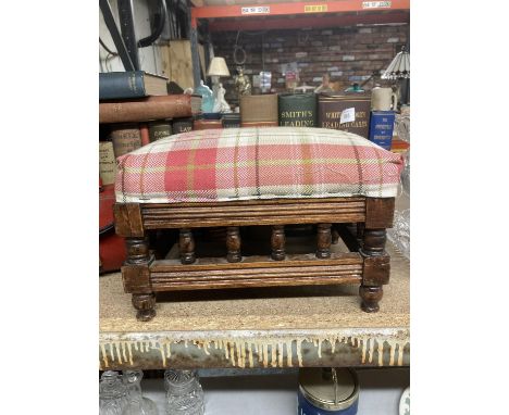 A VINTAGE MAHOGANY UPHOLSTERED FOOTSTOOL 