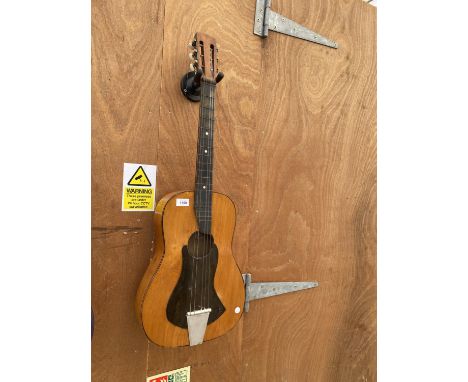 A VINTAGE ACOUSTIC GUITAR 