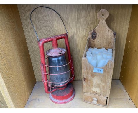 A VINTAGE PINE CANDLE BOX AND A PARAFIN LAMP 