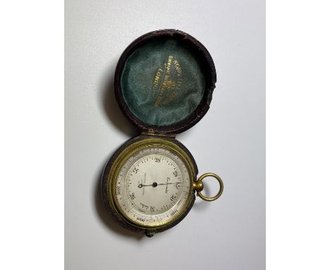 AN EARLY 20TH CENTURY COMPENSATED POCKET BAROMETER BY NEGRETTI &amp; ZAMBRA, LONDON WITH ORIGINAL LEATHER OUTER CASE 