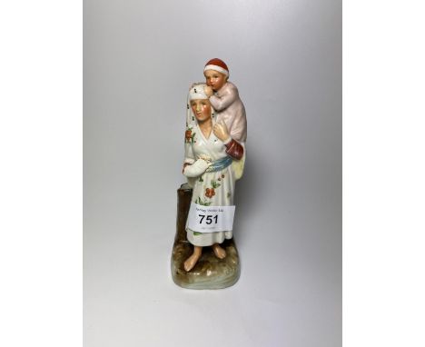 A VINTAGE CONTINENTAL CERAMIC OF A MOTHER AND CHILD WITH MATCH HOLDER AND STRIKER 