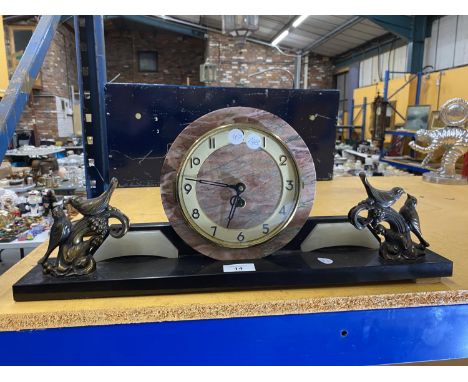 AN ART DECO MARBLE MANTLE CLOCK WITH BRASS BIRD DESIGN 