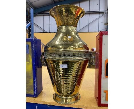 A LARGE DECORATIVE VINTAGE BRASS MIDDLE EASTERN TWIN HANDLED FLOOR VASE, 54CM HEIGHT 