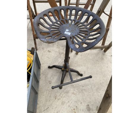 A VINTAGE TRACTOR/IMPLEMENT SEAT BAR STOOL 