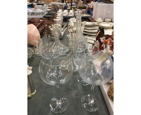 TWO LARGE SHIPS DECANTERS, A LARGE DECANTER AND FOUR LARGE WINE/GIN GLASSES 