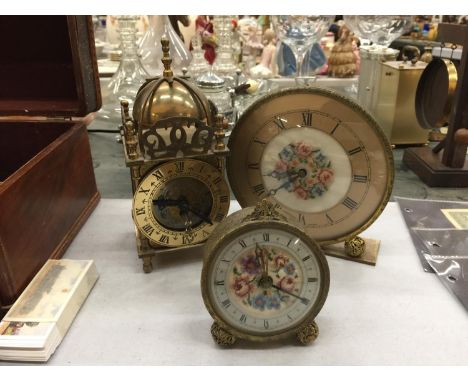 THREE VINTAGE CLOCKS TO INCLUDE A BRASS LANTERN CLOCK, A PETIT POINT MANTLE CLOCK AND ALARM CLOCK 