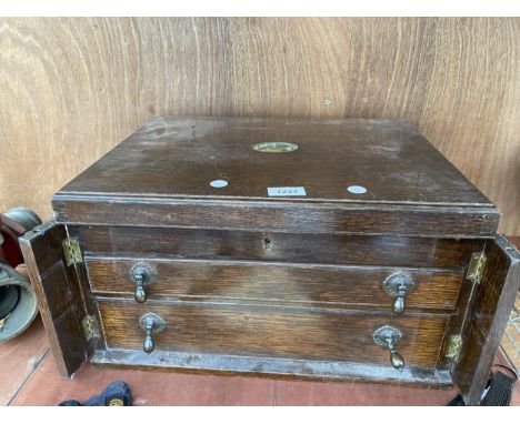 A VINTAGE PART COMPLETE OAK CASED CANTEEN OF CUTLERY 