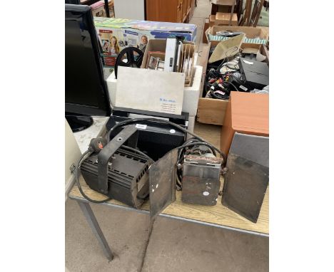 AN ASSORTMENT OF ITEMS TO INCLUDE A BELLS HOWELL PROJECTOR, A CANON CAMERA AND TWO THEATRE STYLE LIGHTS ETC 