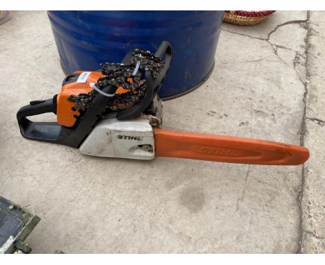 A STIHL MS171 PETROL CHAINSAW WITH THREE SPARE CHAINS