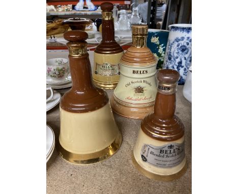 FOUR VINTAGE CERAMIC BELL'S WHISKY BELL SHAPED DECANTERS 