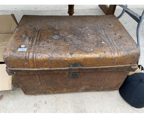 A VINTAGE TRAVEL TRUNK WITH TWO PAIRS OF GARDEN SHEARS 