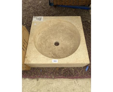 A CREAM SOLID MARBLE WASH BASIN 