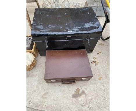 A VINTAGE METAL TRAVEL TRUNK AND A FURTHER VINTAGE LEATHER BRIEFCASE 