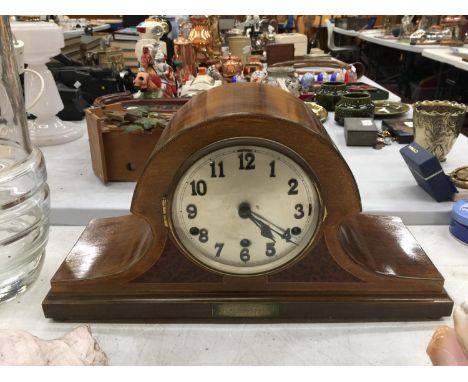 A LARGE VINTAGE MAHOGANY CASED NAPOLEON'S HAT SHAPED MANTLE CLOCK WITH BRASS PLATE STATING IT WAS PRESENTED TO THOMAS STEEL 3