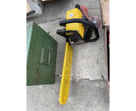 A MCCULLOCH PETROL CHAINSAW WITH SPARE CHAIN 