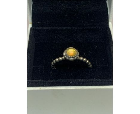 A PANDORA RING IN A PRESENTATION BOX 