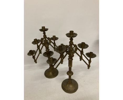 A PAIR OF VINTAGE BRASS CONCERTINA STYLE CANDLESTICKS 