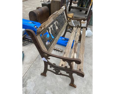 A VINTAGE WOODEN SLATTED CHILDS GARDEN BENCH WITH CAST ENDS AND JUNGLE SCENE BACK 