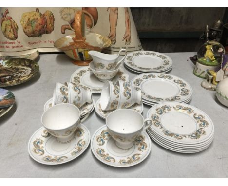 A SUSIE COOPER PART TEASET TO INCLUDE A CAKE PLATE, CUPS, SAUCERS, SIDE PLATES, CREAM JUG AND SUGAR BOWL PLUS A HAND PAINTED 