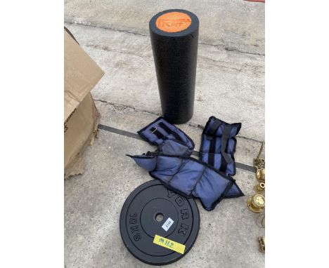 A CAST IRON WEIGHT, A WEIGHT PACK AND A MUSCLE ROLLER ETC 