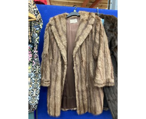 A VINTAGE 'BROWNS OF CHESTER' FUR COAT 