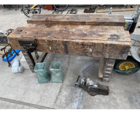 A VINTAGE WOODEN WORK BENCH WITH RECORD NO.52 WOOD VICE 