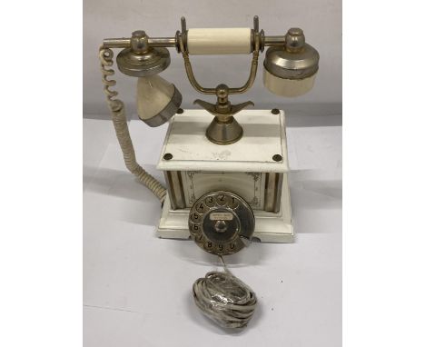 A VINTAGE ITALIAN TELEPHONE WITH GILT DESIGN 