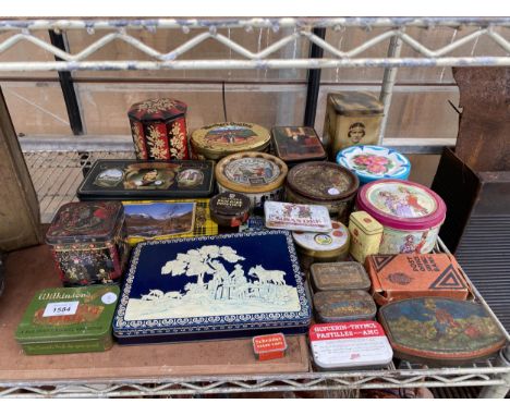 A LARGE ASSORTMENT OF VARIOUS VINTAGE TINS 