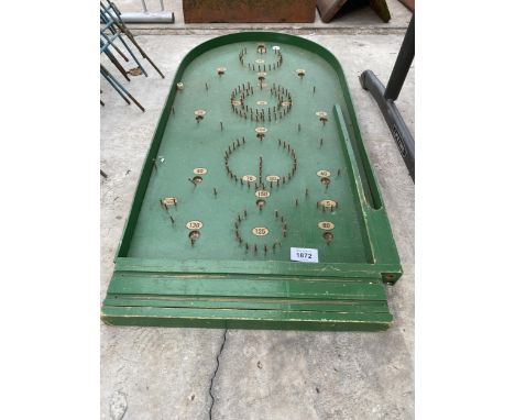 A VINTAGE WOODEN BAGATELLE GAME 