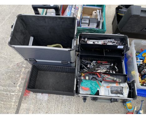 A TWO WHEEL CHEST WITH AN ASSORTMENT OF TOOLS TO INCLUDE SPANNERS AND SOCKETS ETC 