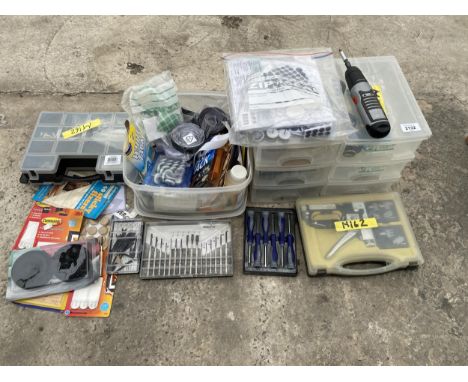 AN ASSORTMENT OF TOOLS TO INCLUDE A STAPLE GUN, SCREW DRIVERS AND FIXING PADS ETC 