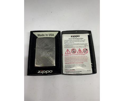 A ZIPPO 80TH ANNIVERSARY LIGHTER IN ORIGINAL PRESENTATION BOX 