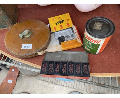 AN ASSORTMENT OF VINTAGE ITEMS TO INCLUDE A CASTROL GREASE TIN, WILLS STAR GIGARETTES DOMINOES AND A LARGE TAPE MEASURE ETC 