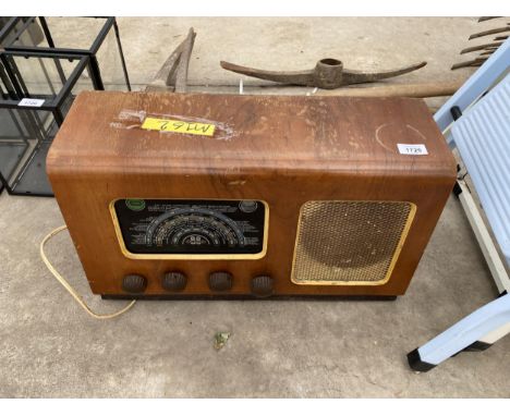 A VINTAGE WOODEN CASED VALVE RADIO 