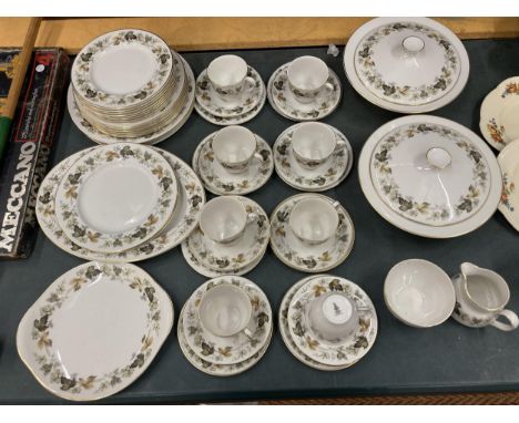 A ROYAL DOULTON 'LARCHMONT' PART DINNER SERVICE TO INCLUDE SERVING TUREENS, VARIOUS SIZES OF PLATES, SERVING PLATES, CUPS, SA