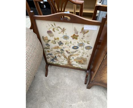 A MAHOGANY FRAMED FIRESCREEN WITH EMBROIDERY DECORATION DEPICTING EXOTIC BIRDS AND FLOWERS 