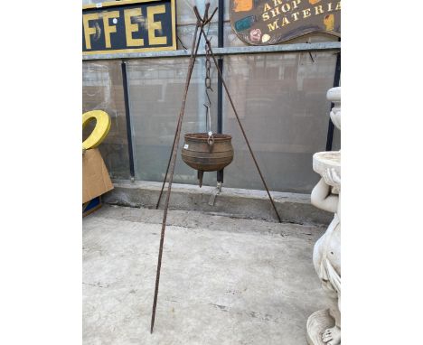 A VINTAGE CAST IRON COOKING POT WITH TRIPOD STEEL FRAME 