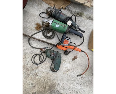 AN ASSORTMENT OF POWER TOOLS TO INCLUDE A HEDGE TRIMMER AND TWO ANGLE GRINDERS ETC 