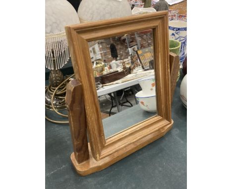 A VINTAGE PINE DRESSING TABLE MIRROR 