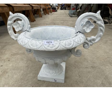 A DECORATIVE CAST IRON URN PLANTER 
